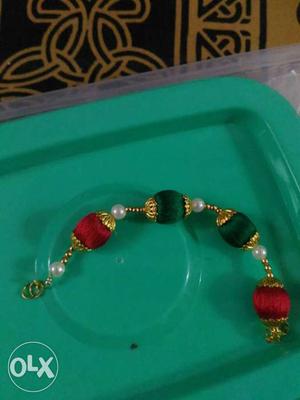 Gold, Green And Red Bracelet