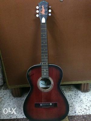 Maple red guitar at excellent condition.
