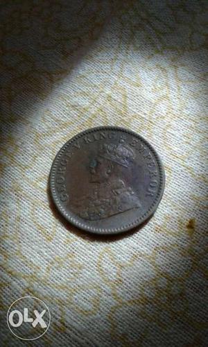 One king George v quarter Anna coin 