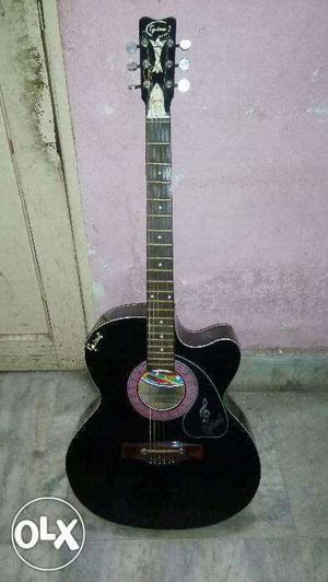 Only three month old black cutway acoustic