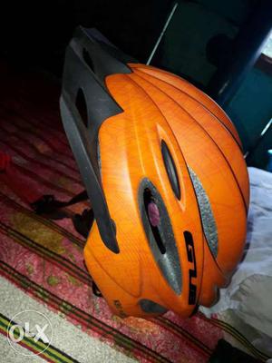 Orange And Black Bicycle Helmet