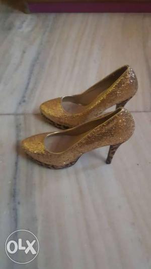 Pair Of Brown Glittered Heel Shoes