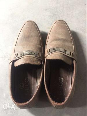 Pair Of Brown Gucci Penny Loafers