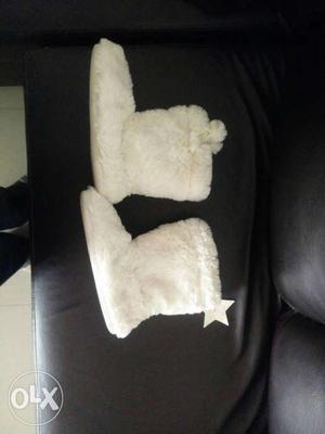 Pair Of White Winter Boots