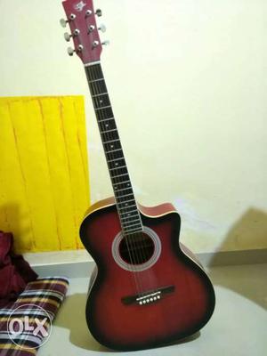 Red Acoustic Guitar