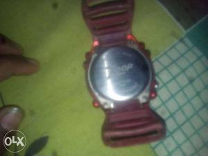 Round Watch With Maroon Rubber Stra P