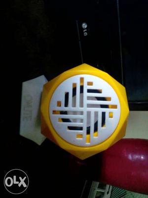 Round Yellow And White Speaker