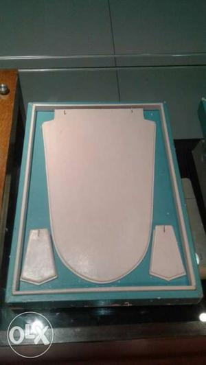 Teal And White Wooden Board