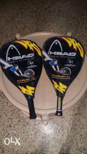 Two Black Head Tennis Rackets