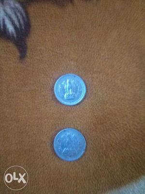 Two Round Silver Coins