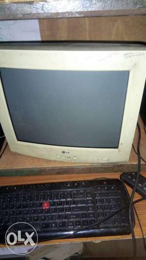 White LG Computer CRT Monitor, Black Keyboard