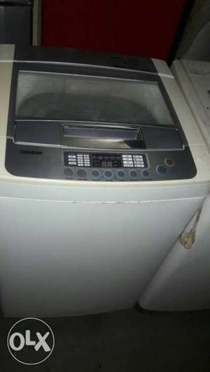 White Top-load Laundry Machine