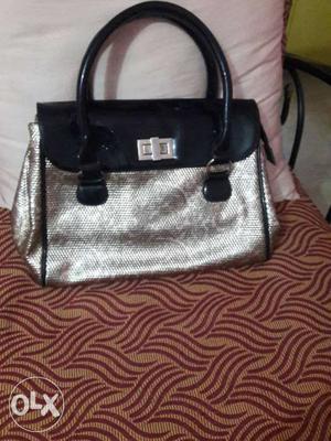 Women's Silver And Black Hand Bag