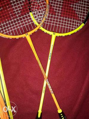 Yellow-and-Orange Badminton Rackets