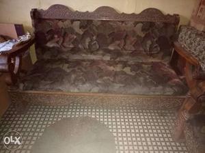 Brown Wooden Framed Floral Padded Couch