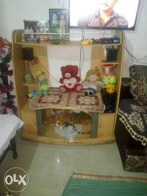 Brown Wooden TV Hutch Filled With Plush Toys And Item Lot