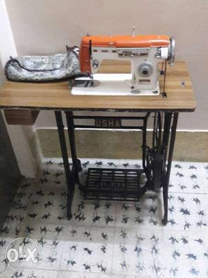 Orange And White USHA Treadle Sewing Machine