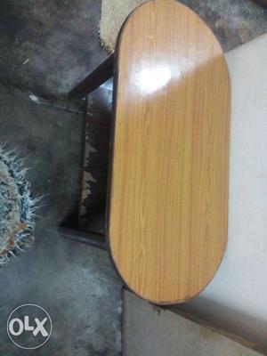 Oval Brown And Black Wooden Table