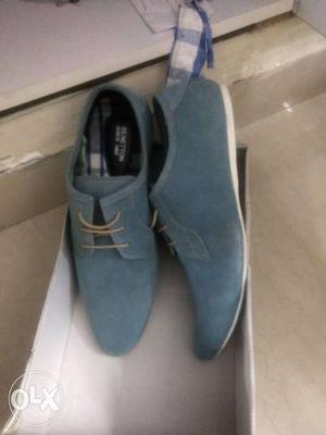 Pair Of Blue Loafers Shoes