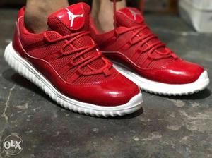 Pair Of Red Air Jordan 11 Low Basketball Shoes