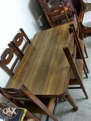 Rectangular Brown Wooden Dining Table With Six Chairs