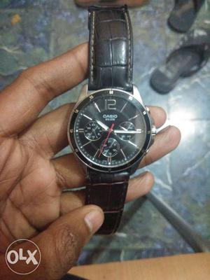 Round Black Casio Chronograph Watch With Black Leather Strap