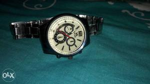 Round White-face Chronograph Watch With Silver Link Bracelet