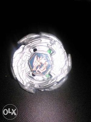 Silver And Blue Beyblade Toy