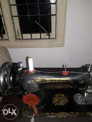Singer hand sewing machine seven years old.good
