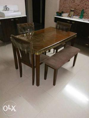 Stylish Dinning Table With 3 chairs + banch.
