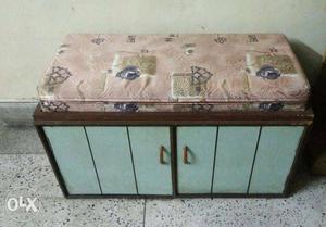 Teal And Brown Wooden Cabinet