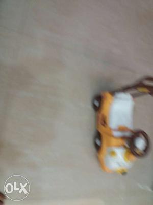 Toddler's Yellow And White Plastic Ride-on Toy