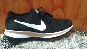 Unpaired Black And White Nike Yoshe Run