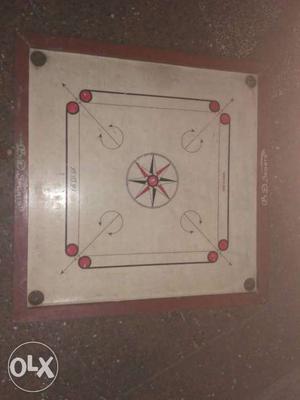 White And Brown Wooden Carom Board