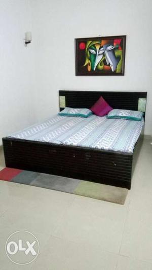 Wooden queen size bed