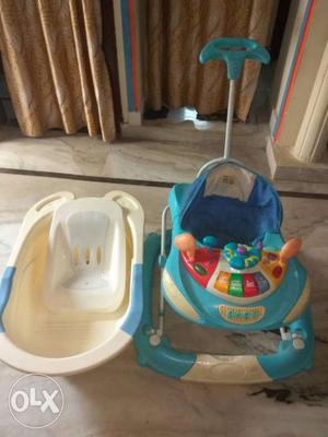 Baby's Teal And Beige Push Walker