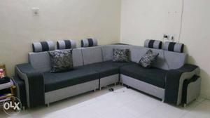 Black And Gray Sectional Sofa With 7 Pillows & 2 stools
