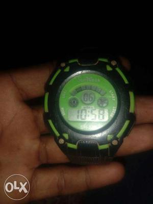 Black And Green Digital Watch