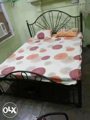 Black Metal Bed Grill With White-orange-red Bed Sheet Set
