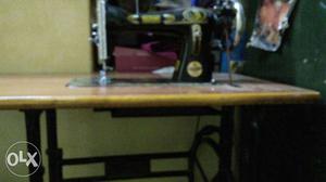 Black Sewing Machine With Treadle