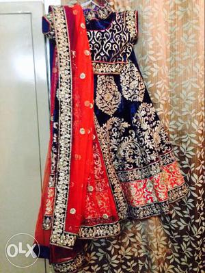 Blue & red color bridal lehanga buying from