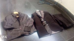 Branded Coat suit for sale rs.. Brown colour.