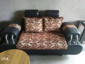 Brown And White Cushion Loveseat Good condition