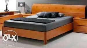 Brown Wooden Platform Bed With Grey Mattress