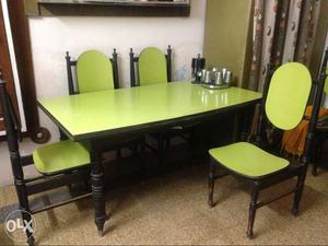 Dining table with 5 chairs. All in wooden