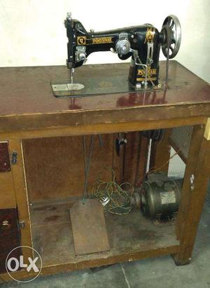 Embroidery Machine including Motor and Table