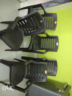 Five Brown Plastic Lawn Chairs cello - maharaja brown matt