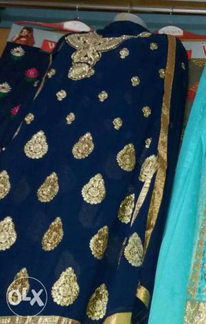 Gold-colored And Blue Floral Salwar Kameez