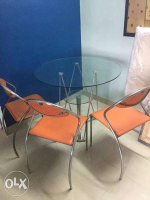 Good condition dinning table with three chairs and