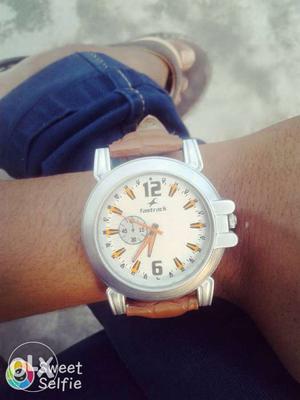 Its a fastrack watch withBrown Leather Strap